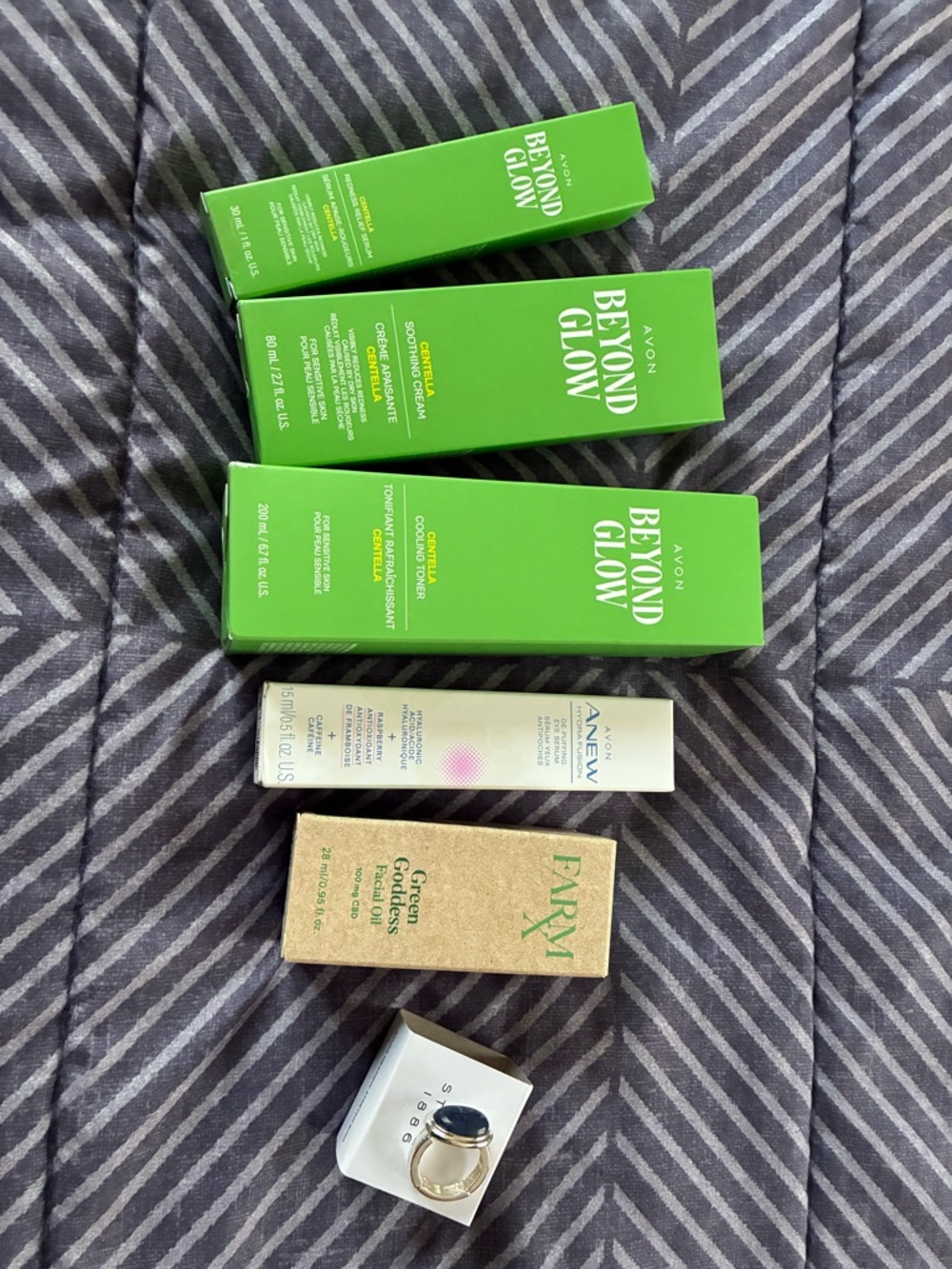 Avon Beyond Glow Skincare Trio in Bright Green with Assorted Serums